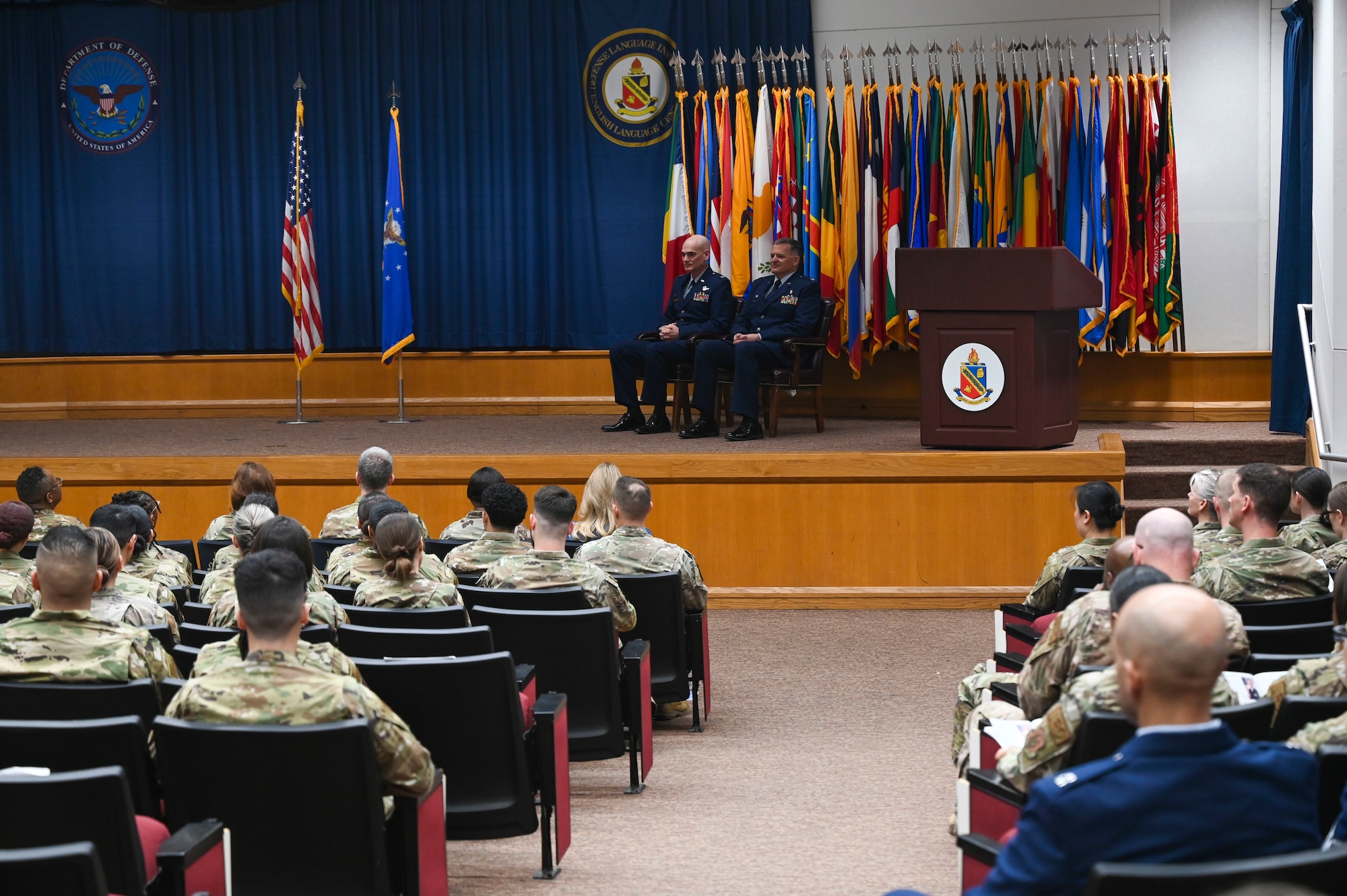 Members of the 433rd Airlift Wing listen to opening remarks during an assumption of command ceremony at Joint Base San Antonio-Lackland, Texas, March 3, 2024