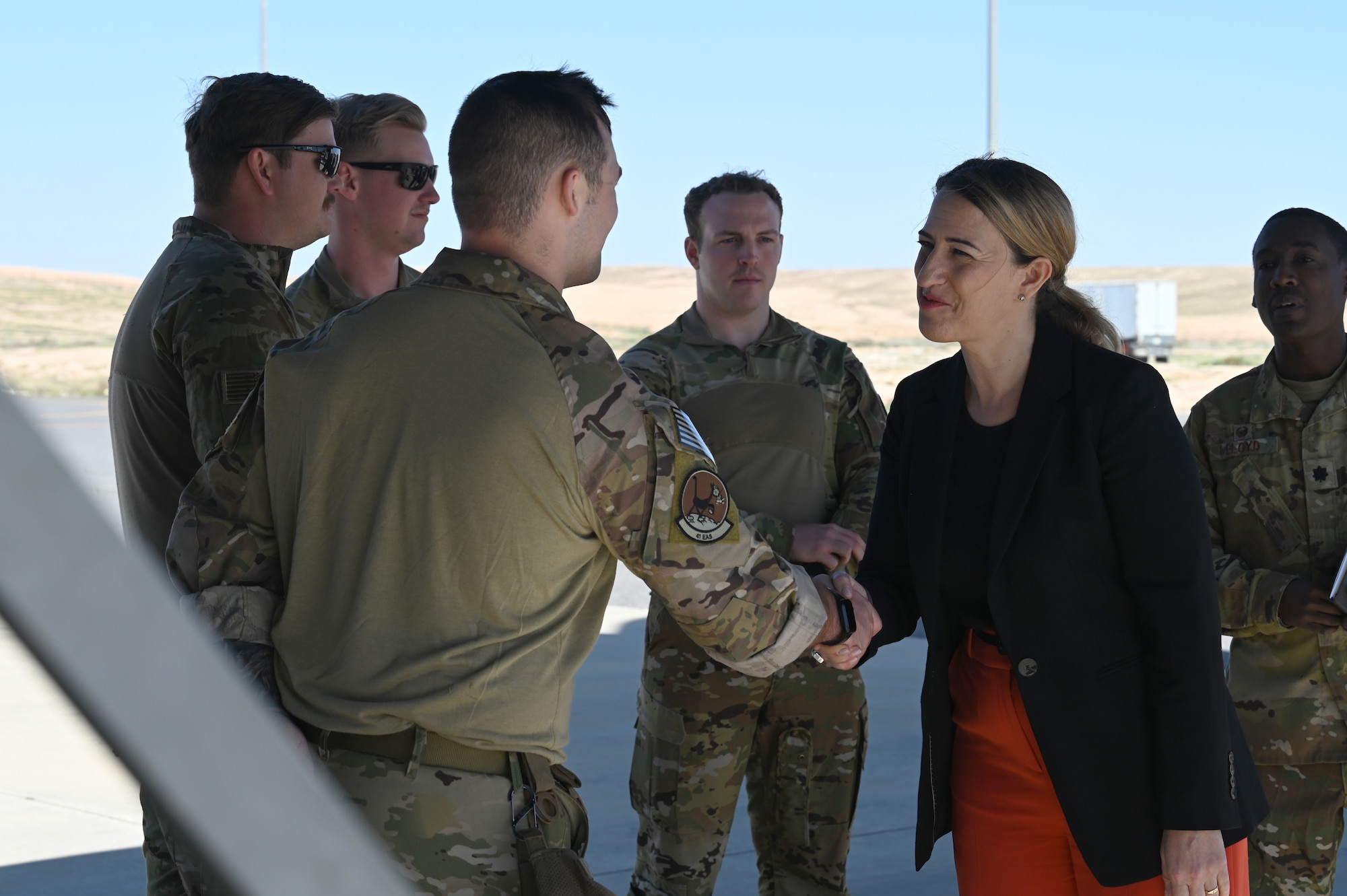 Yael Lempert, U.S. Ambassador to Jordan, meets with U.S. Air Force C-130 aircrew at an undisclosed airfield.