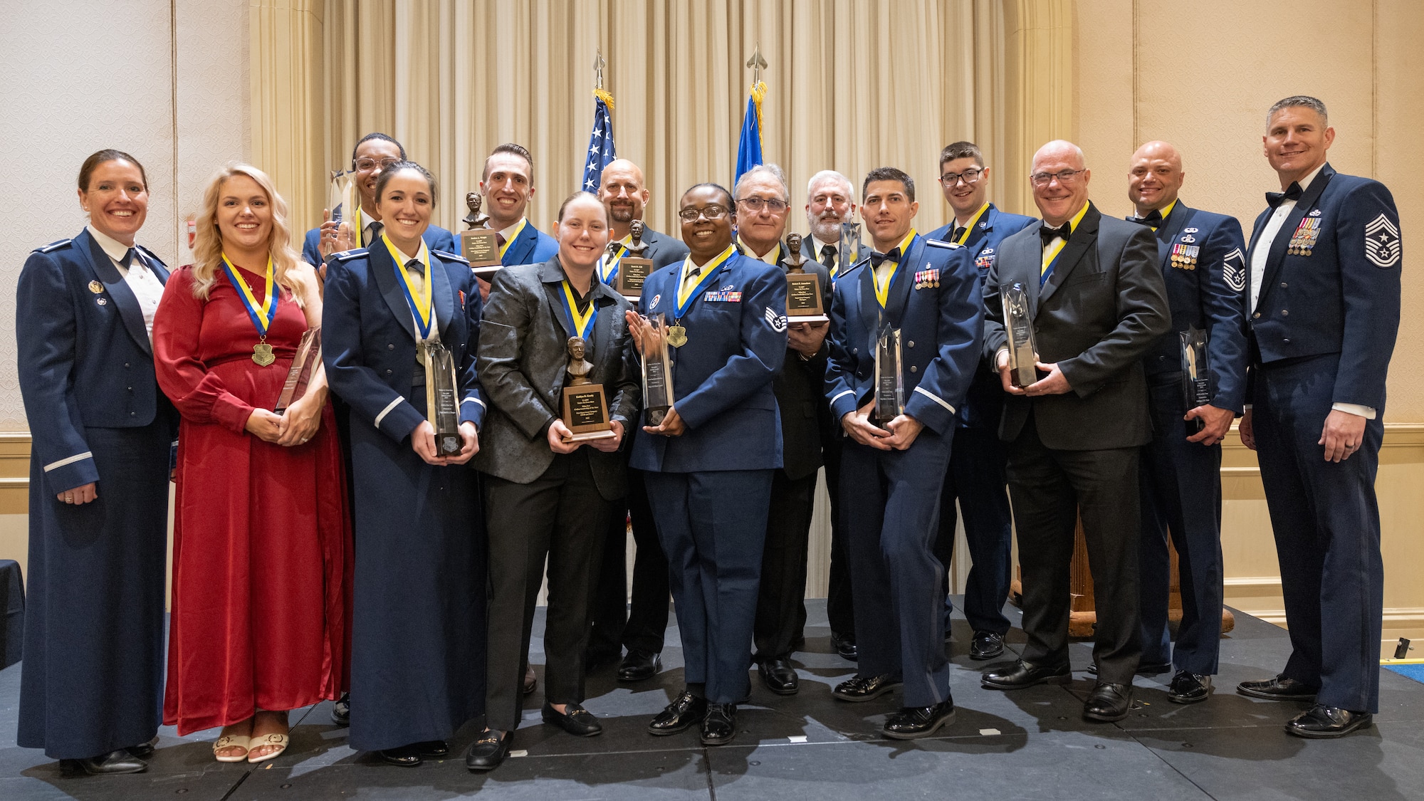 group photo with awards