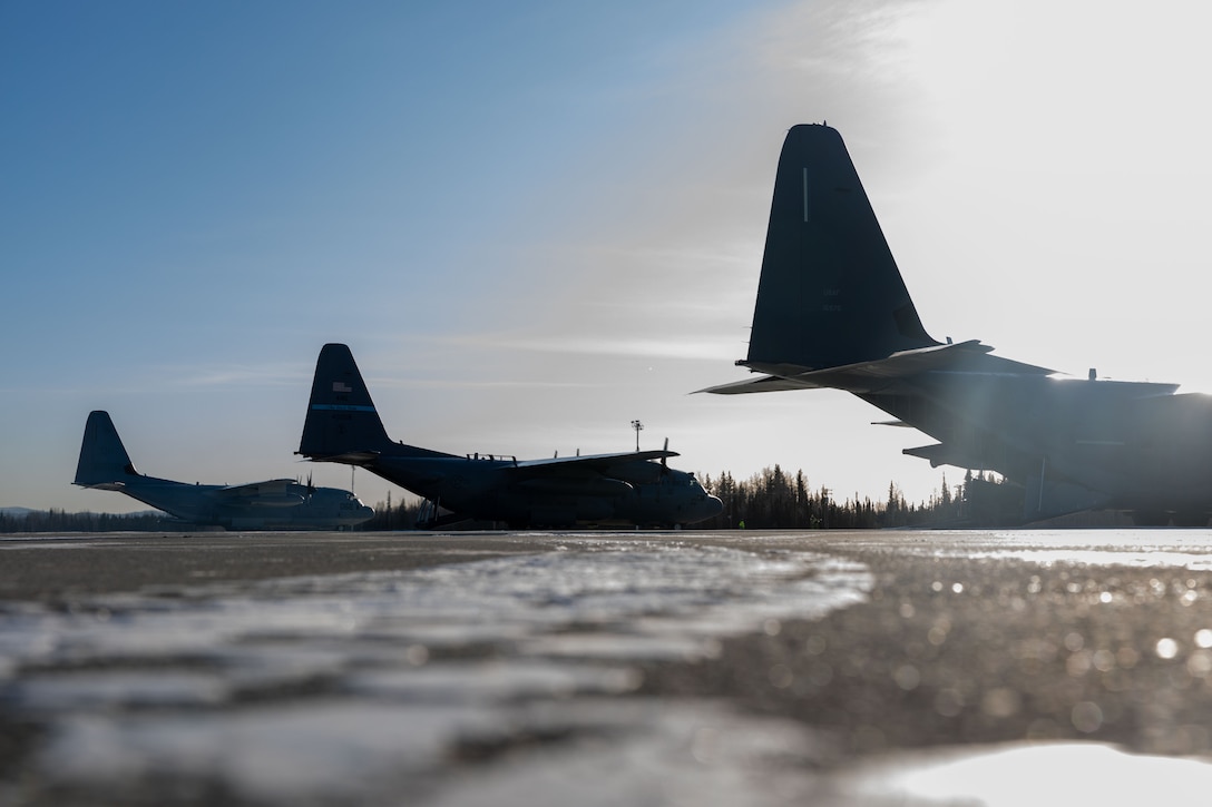 U.S. Marine Corps and Air Force C-130J Hercules aircrafts land before a High Mobility Artillery Rocket System (HIMARS) Rapid Infiltration, also known as a HIRAIN, with Fox Battery, 2nd Battalion, 14th Marine Regiment, 4th Marine Division, Marine Forces Reserve during exercise Arctic Edge 2024, at Eielson Air Force Base, Alaska, Feb. 24, 2024. The HIRAIN training demonstrated Marine Forces Reserve’s ability to rapidly deploy the HIMARS to meet and deter any threats in any environment, including harsh arctic environments. Arctic Edge 2024 (AE24) is a U.S. Northern Command-led homeland defense exercise demonstrating the U.S. military’s capabilities in extreme cold weather, joint force readiness, and U.S. military commitment to mutual strategic security interests in the arctic region. (U.S. Marine Corps photo by Lance Cpl. Madisyn Paschal)