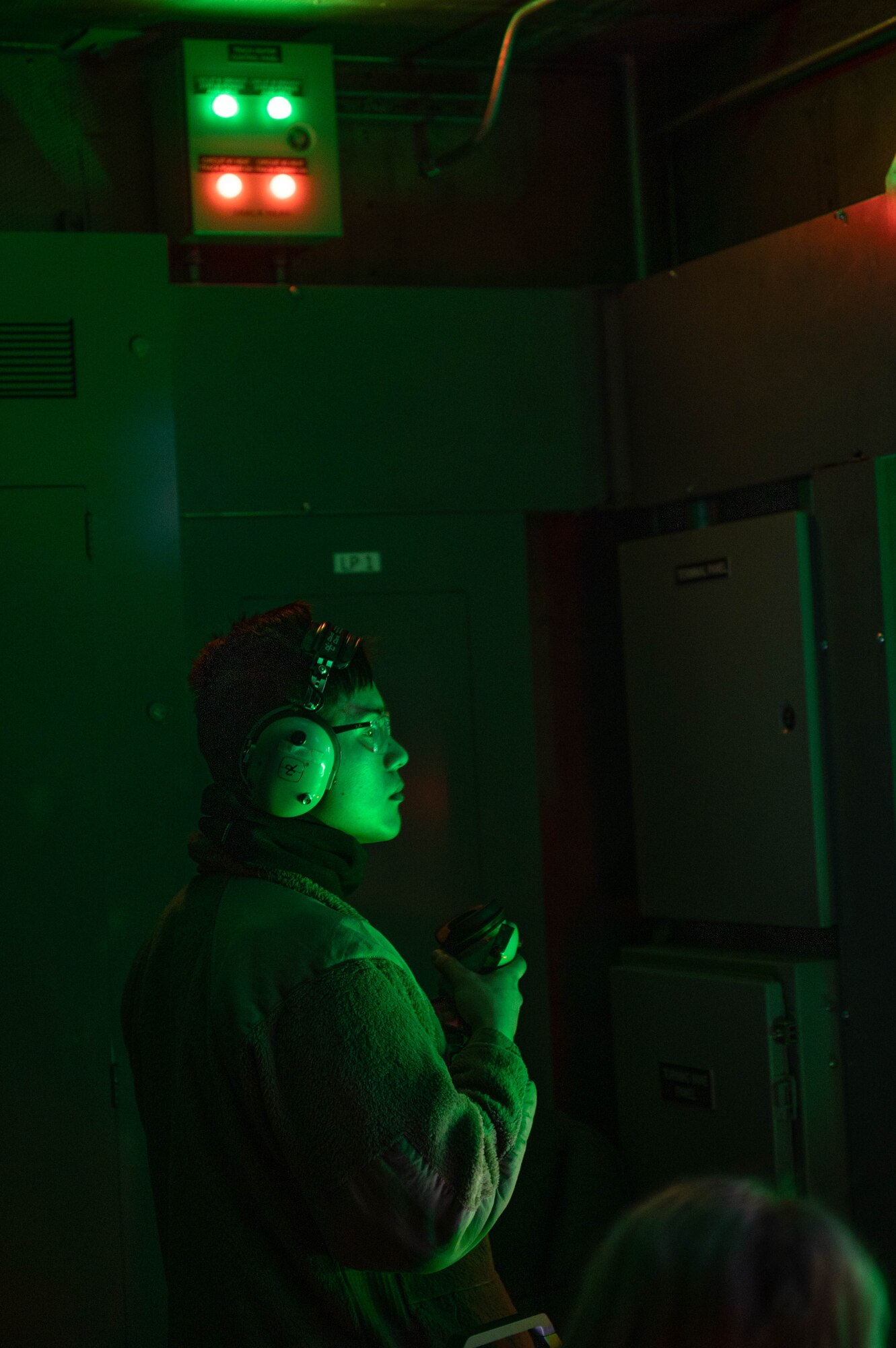 U.S. Air Force Senior Airman Paolo Ignacio, 354th Maintenance Squadron propulsion flight conducts an installed engine run demonstration during the 354th MXS spouses' open house March 1, 2024 at Eielson Air Force Base, Alaska