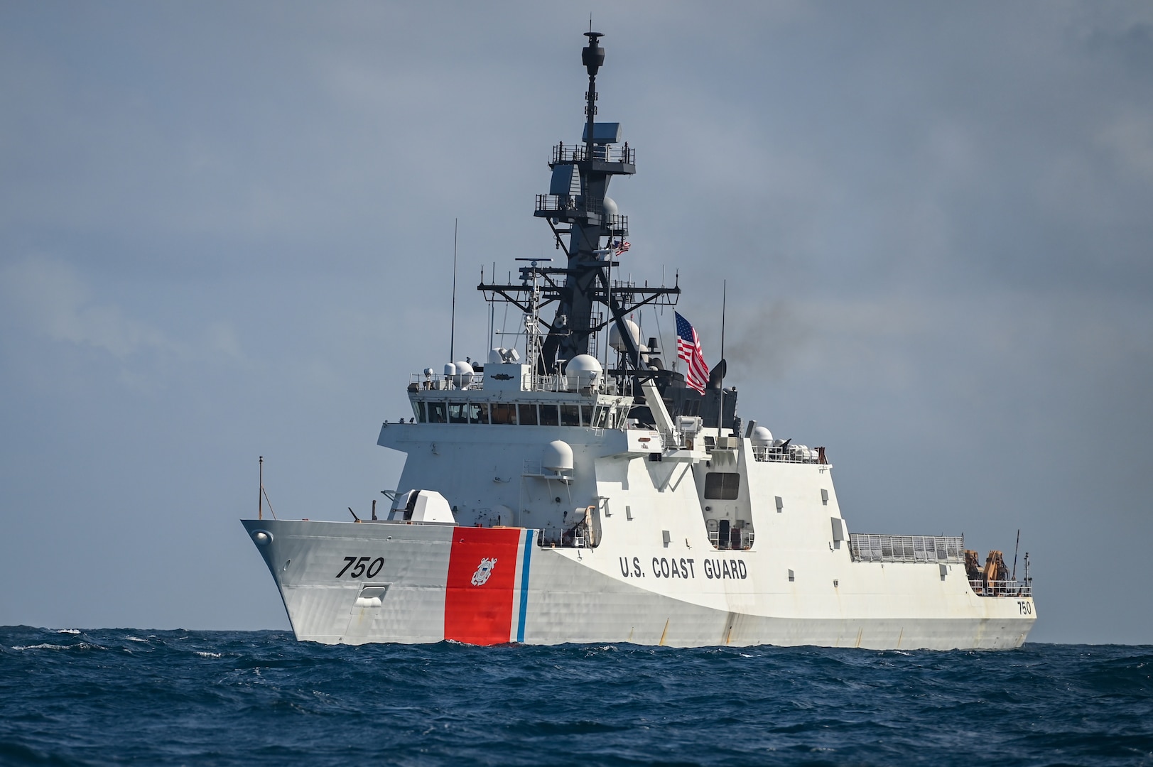 U.S. Coast Guard Cutter Bertholf (WMSL 750) transits near the Singapore Straits, Feb. 29, 2024. The Bertholf is a 418-foot National Security Cutter currently deployed to the Indo-Pacific region under the tactical control of U.S. 7th Fleet. (U.S. Coast Guard photo by Petty Officer Steve Strohmaier)