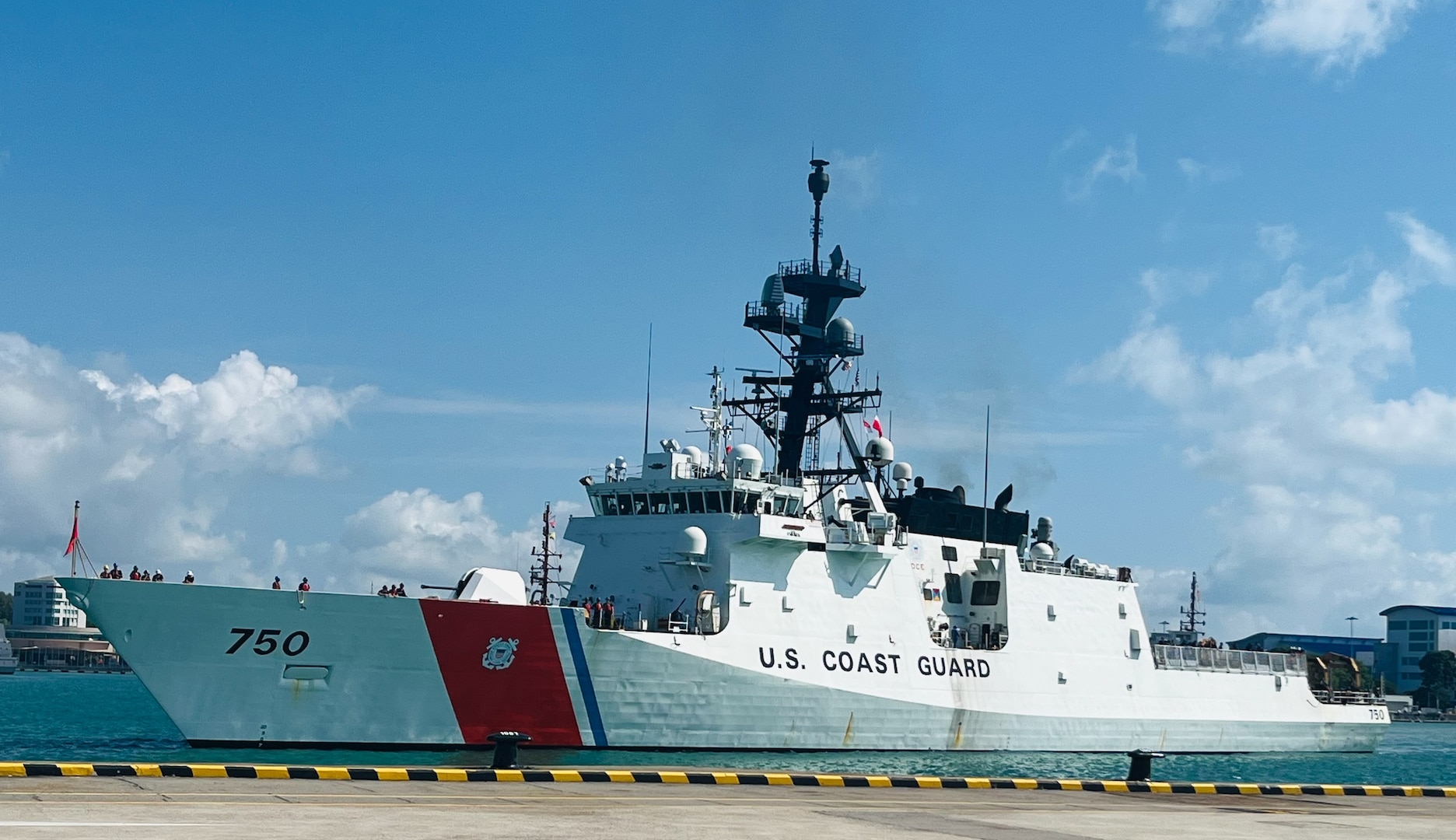 U.S. Coast Guard Cutter Bertholf (WMSL 750) arrives at Changi Naval Base in Singapore, Feb. 25, 2024. The Bertholf moored next to USS Gabrielle Giffords (LCS 10), a U.S. Navy Littoral Combat Ship, also in the region to support an open Indo-Pacific region. (U.S. Coast Guard photo by Cmdr. Trevor Parra)