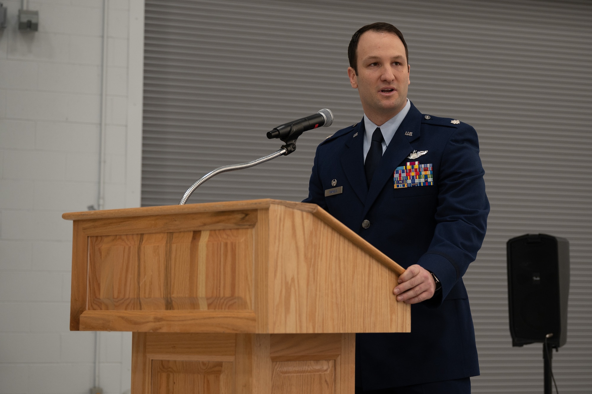 U.S. Air Force Lt. Col. Thomas Daniels, incoming 354th Operations Support Squadron commander, addresses family, friends and Airmen at the OSS change of command at Eielson Air Force Base, Alaska, March 1, 2024.
