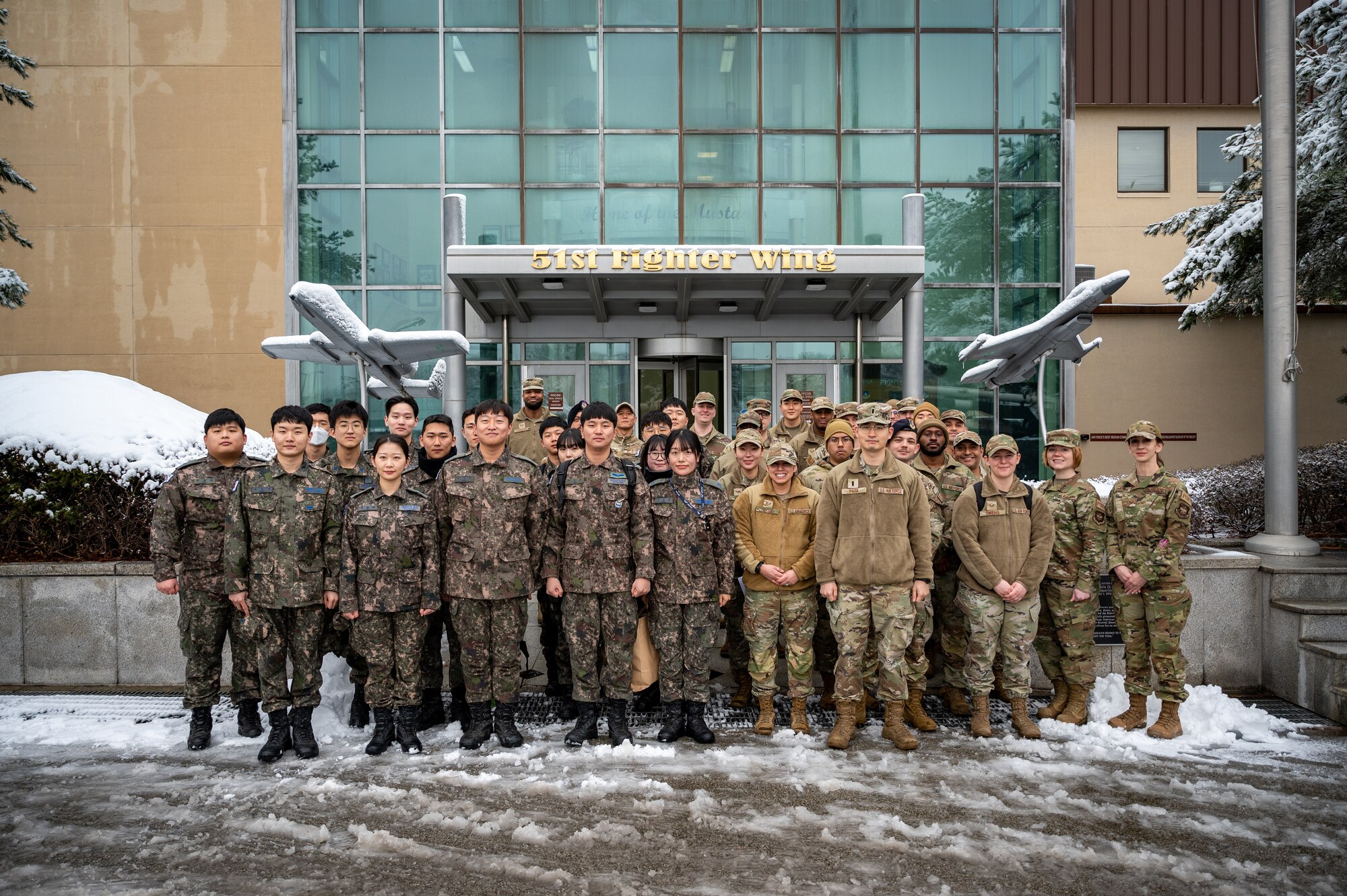 Republic of Korea Air Force airmen and U.S. Air Force Airmen assigned to the 51st Fighter Wing pose for a group photo during a Noncommissioned Officer Summit at Osan Air Base, Republic of Korea, Feb. 22, 2024. The summit played a pivotal role in strengthening the U.S. and ROK alliance by deepening mutual understanding and operational readiness among the NCO corps, solidifying the partnership as a cornerstone of regional security. (U.S. Air Force photo by Staff Sgt. Thomas Sjoberg)