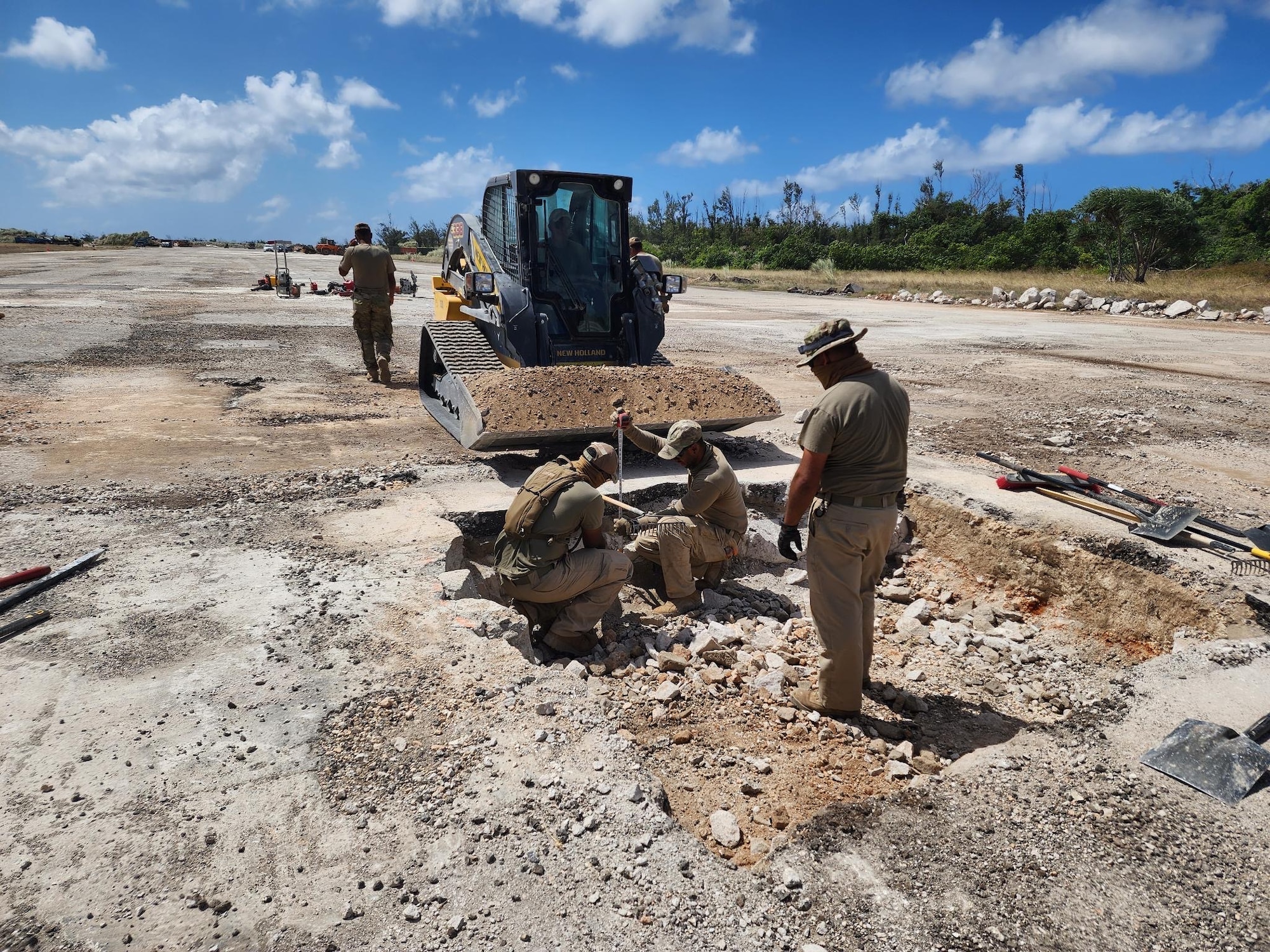 The 356th Expeditionary Prime Base Engineer Emergency Force (BEEF) Squadron (EPBS) engage in a 48-hour Expedient and Expeditionary Airfield Damage Repair (E-ADR) exercise at the Pacific Regional Training Center - Andersen, Guam, Feb. 26, 2024. The primary objective of this exercise was to demonstrate the team’s proficiency under prescribed time constraints when repairing a specified number of craters from a simulated airfield attack. (Courtesy Photo)