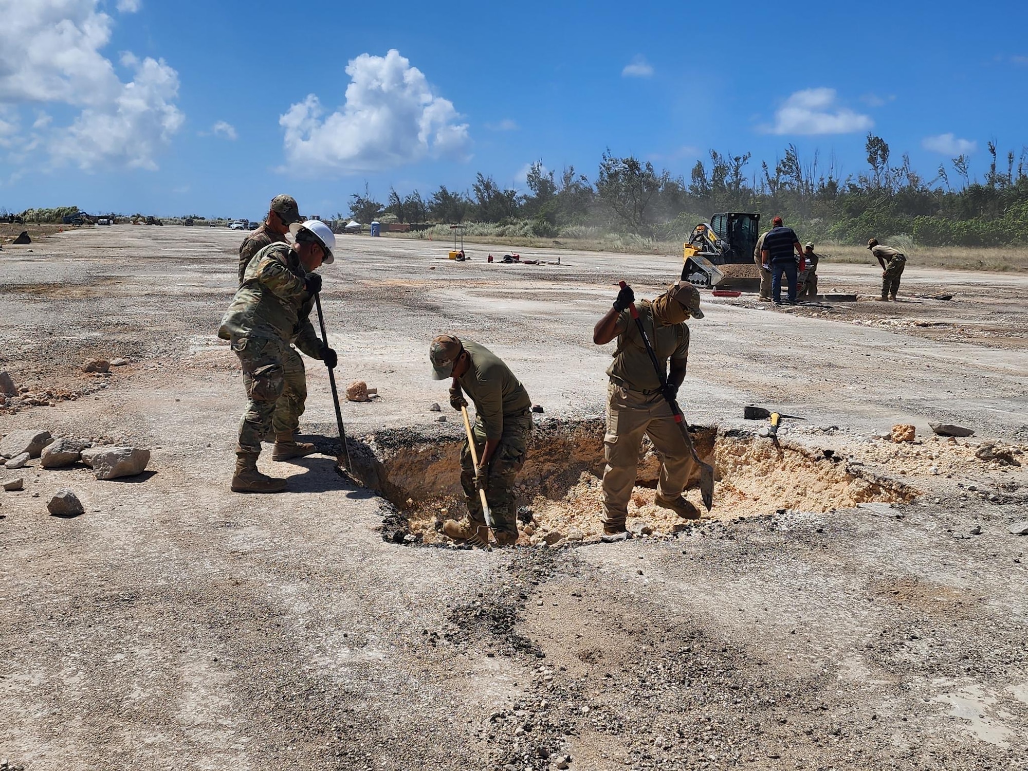 The 356th Expeditionary Prime Base Engineer Emergency Force (BEEF) Squadron (EPBS) engage in a 48-hour Expedient and Expeditionary Airfield Damage Repair (E-ADR) exercise at the Pacific Regional Training Center - Andersen, Guam, Feb. 26, 2024. The primary objective of this exercise was to demonstrate the team’s proficiency under prescribed time constraints when repairing a specified number of craters from a simulated airfield attack. (Courtesy Photo)