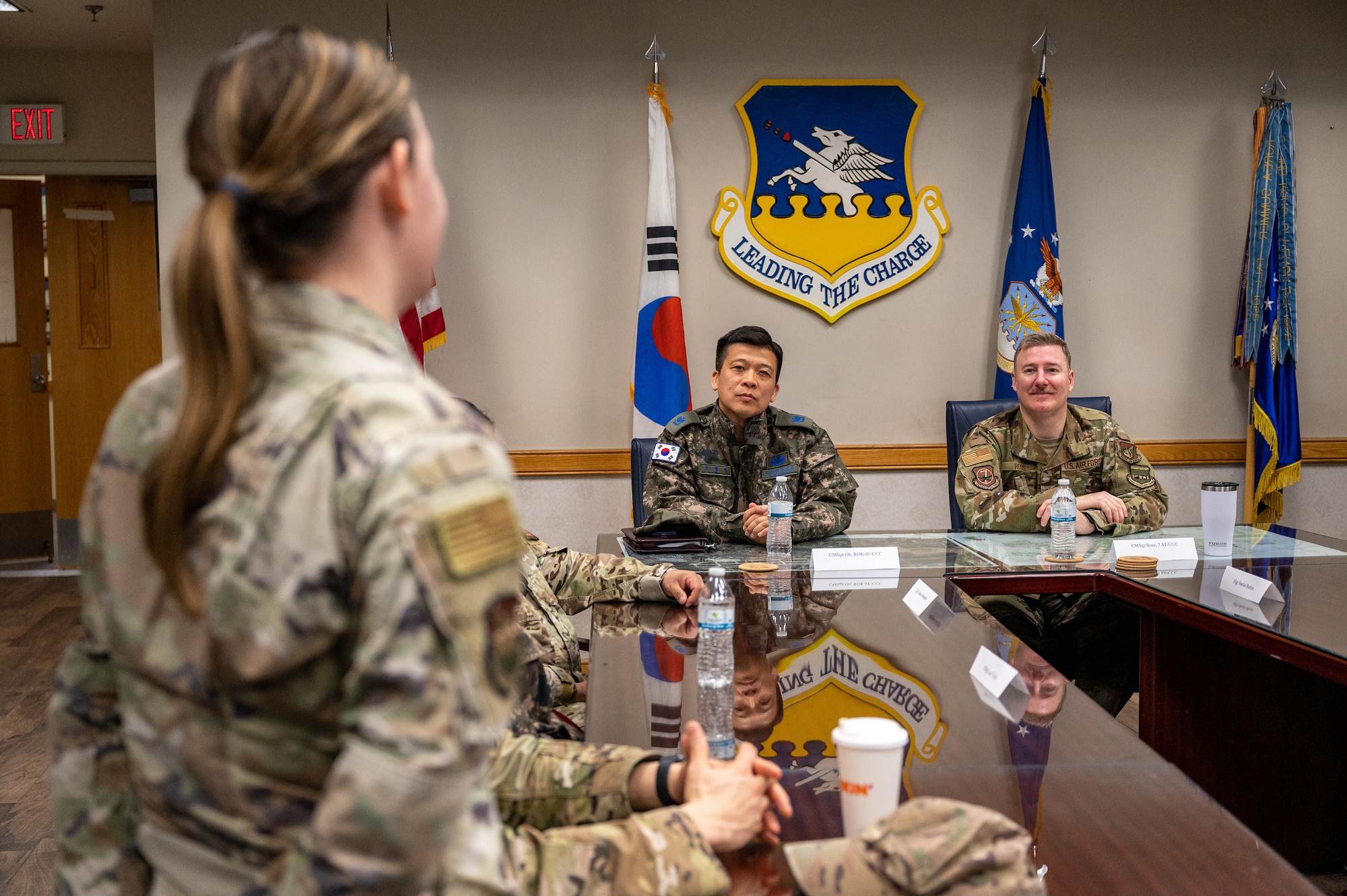 Republic of Korea Air Force Chief Master Sgt. Oh, Kwang-Young, ROKAF Operations Command command chief, left, and U.S. Air Force Chief Master Sgt. Jeremiah Ross, 7th Air Force command chief, respond to questions from U.S. and ROKAF noncommissioned officers during a Noncommissioned Officer Summit at Osan Air Base, Republic of Korea, Feb. 22, 2024. The summit provided a unique platform for U.S. and ROKAF NCOs to share insights, engage in discussions and partake in activities that fostered unity and camaraderie. (U.S. Air Force photo by Staff Sgt. Thomas Sjoberg)