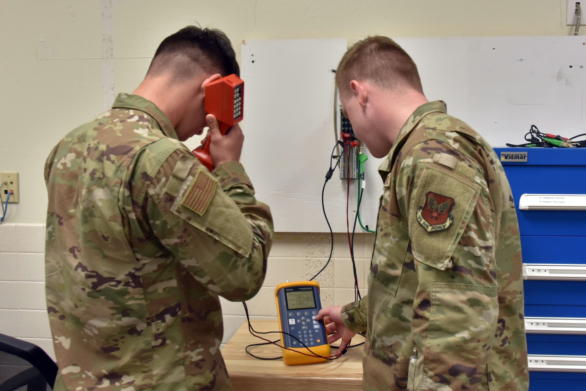 Airmen practice using telecom equipment