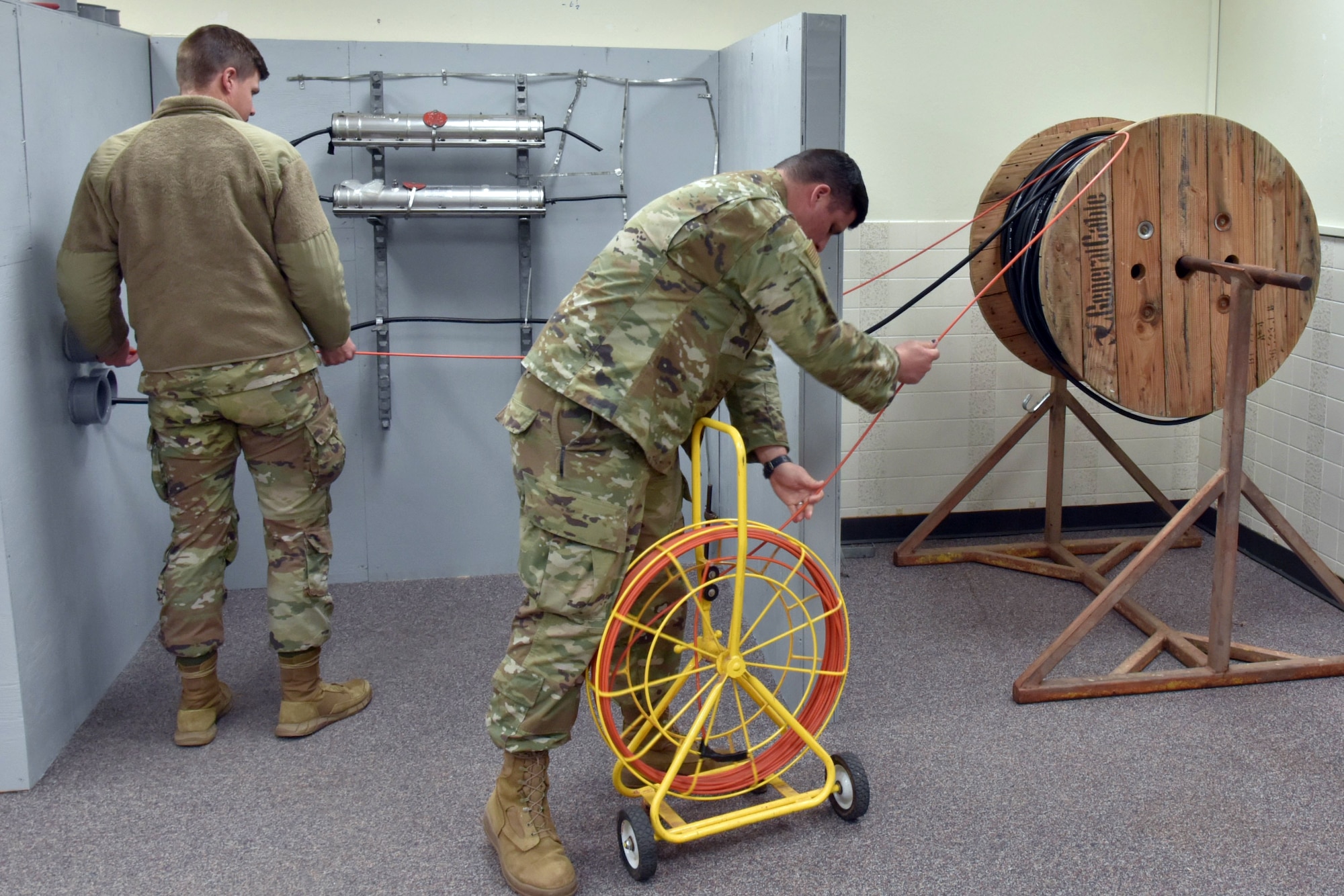 Airmen practice using telecom equipment