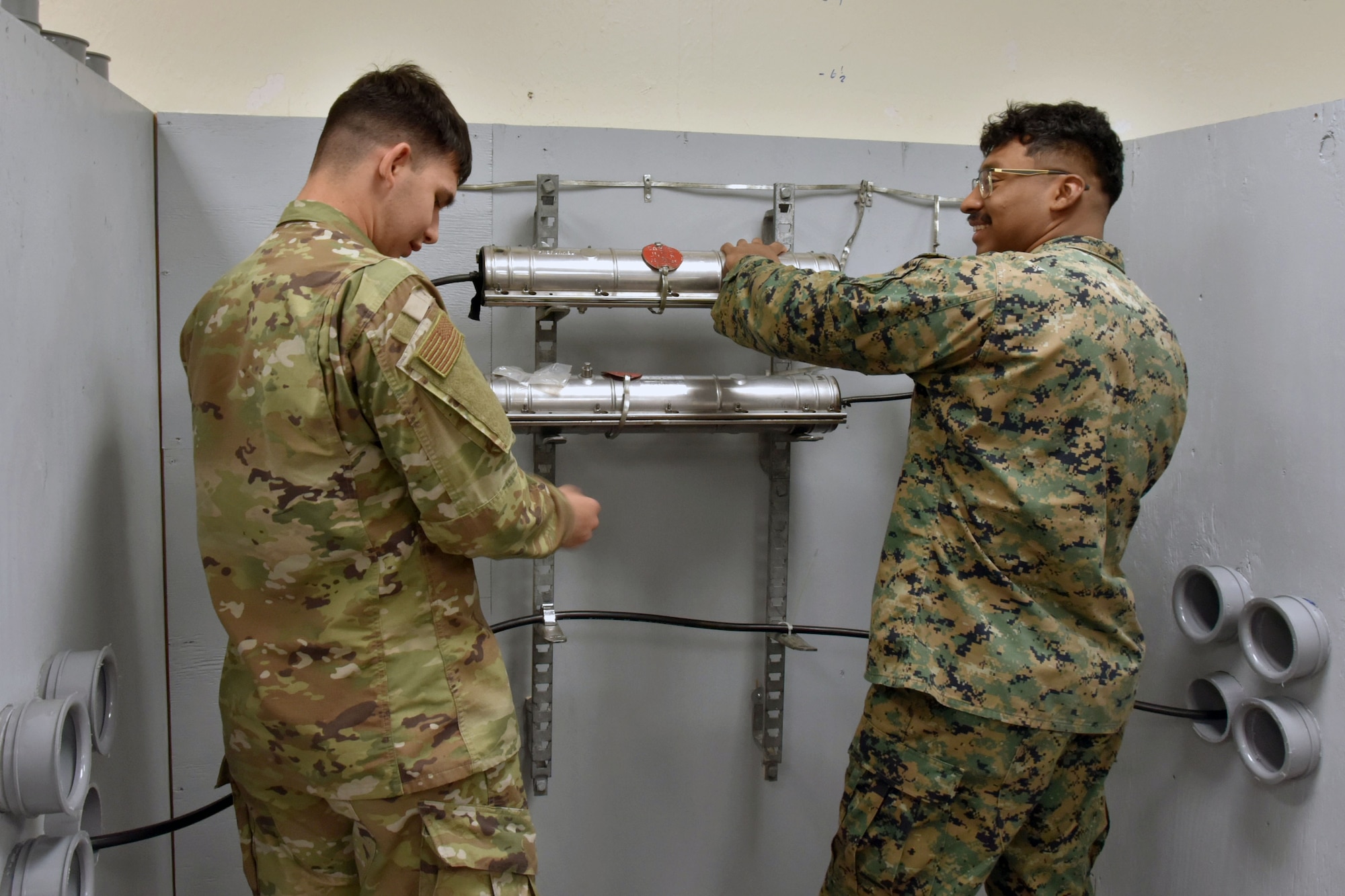 Airmen practice using telecom equipment