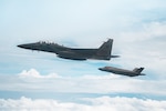 A Republic of Singapore Air Force F-15SG and U.S. Air Force F-35 Lightning II participate in bilateral training over Singapore, March 4, 2024. The bilateral training encompassed the USAF F-35 and RSAF F-15 and F-16 aircraft flying together to improve interoperability and cohesion amongst the partner services. Partnership activities enhance trust and increase global stability, security and prosperity while upholding international law and promoting shared values. (Republic of Singapore Air Force photo by CPL Timothy Khor)