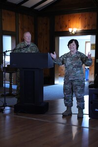 Brig. Gen. Laura McHugh, right, Deputy Adjutant General - Army, and Brig. Gen. Michael J. Regan Jr., Deputy Adjutant General - Air present the certificates for the Pennsylvania National Guard Media Contest during a ceremony at Fort Indiantown Gap, Pennsylvania, March 3, 2024. McHugh and Regan presented awards including the Army Photographer of the Year, Air Force Communicator of the Year. (U.S. Army National Guard photo by Pfc. Skylin Simpson)