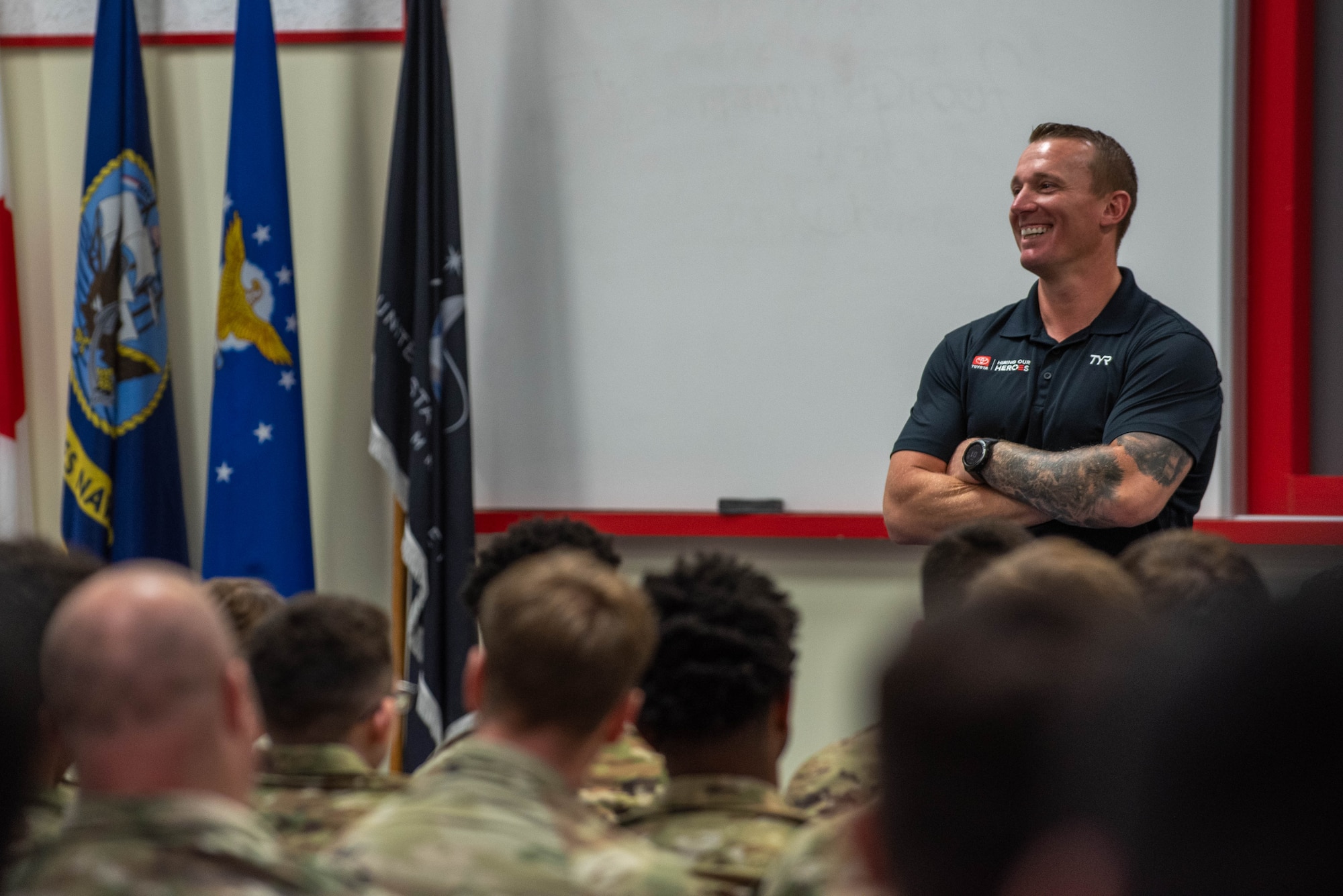 Dakota Meyer holding a briefing with Kadena Airmen