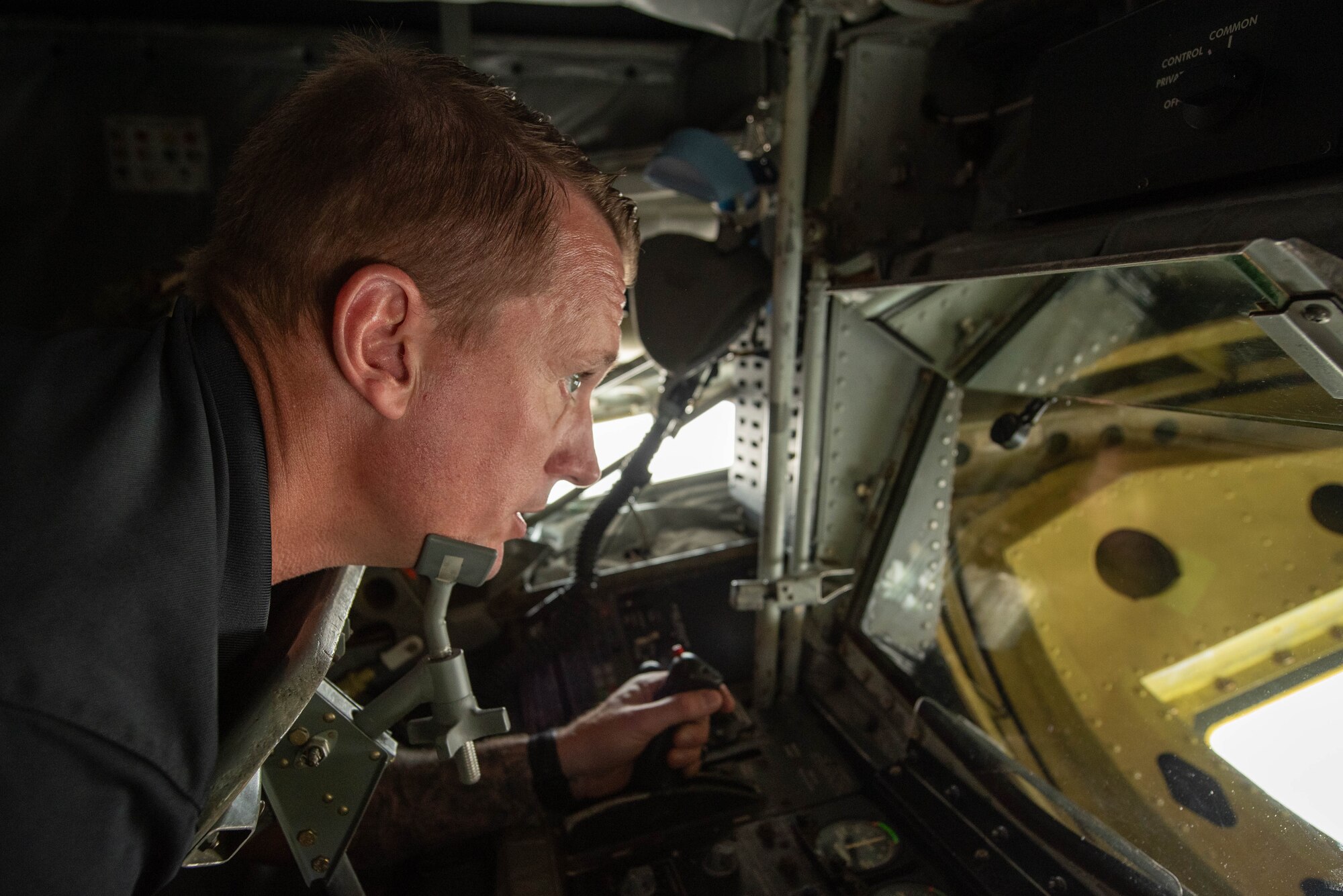 Dakota Meyer looking through a boom operators window