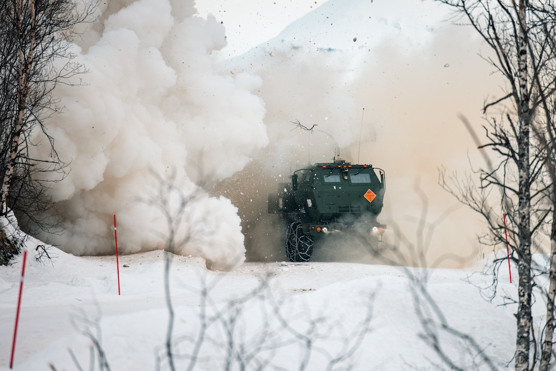 U.S. Marines with 2nd Battalion, 10th Marine Regiment, 2nd Marine Division, launch a High Mobility Artillery Rocket System during a live-fire training event in preparation for Exercise Nordic Response 24 in Setermoen, Norway, Feb. 27, 2024. Exercise Nordic Response, formerly known as Cold Response, is a NATO training event conducted every two years to promote military competency in arctic environments and to foster interoperability between the U.S. Marine Corps and allied nations. (U.S. Marine Corps photo by Warrant Officer Akeel Austin)