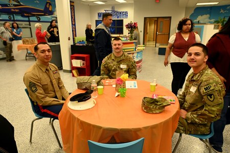 L-R, Gunnery Sgt. Timothy Rodriguez, Sgt 1st Class Courtney Kayser, Spc. Edbert Alvarado-Franceschi