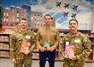 Soldiers with books in library.