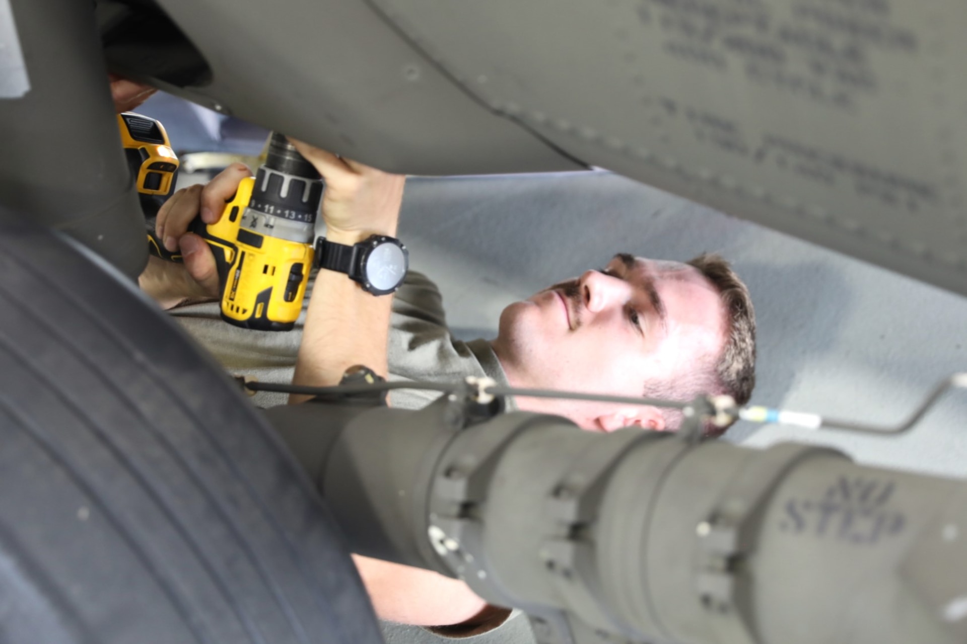 U.S. Soldiers with Delta Company, 2-104th General Support Aviation Battalion, 28th Expeditionary Combat Aviation Brigade perform maintenance checks on a UH-60 Black Hawk helicopter at Pennsylvania Army National Guard Army Aviation Support Facility #1 at Muir Army Heliport at Fort Indiantown Gap, Sept. 9, 2023. These checks are completed on a flight mileage basis to maintain the functionality and safety of the aircraft. (U.S. Army National Guard photo by 2nd Lt. Kate Kramer)