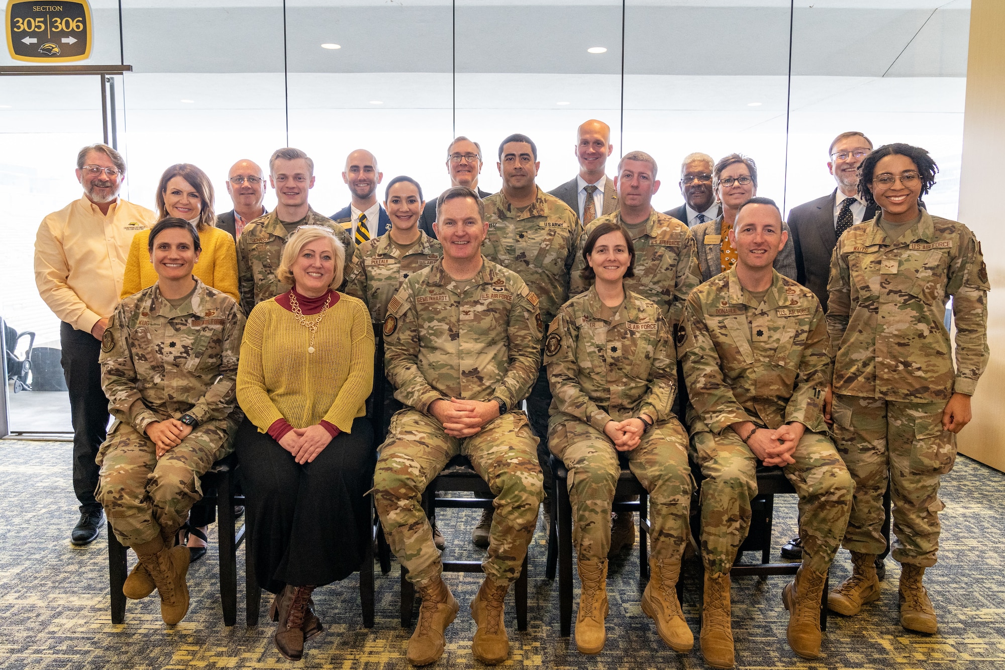 Members from the 81st Training Wing and staff from the University of Southern Mississippi pose for a photo in Hattiesburg, Mississippi, March 1, 2024.