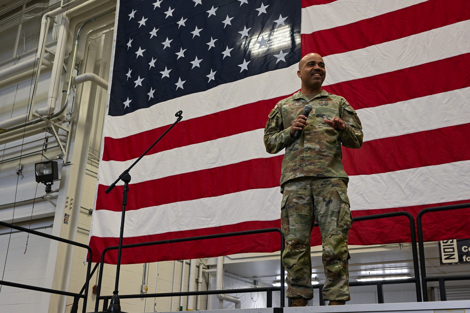 Chief Master Sgt. Israel Nuñez, senior enlisted advisor to the Chief of Air Force Reserve and Command Chief Master Sergeant of Air Force Reserve Command, speaks with 910th Airlift Wing Airmen during an enlisted all call at Youngstown Air Reserve Station, Ohio, March 3, 2024.