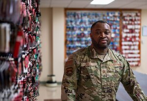 Man works in uniforms section