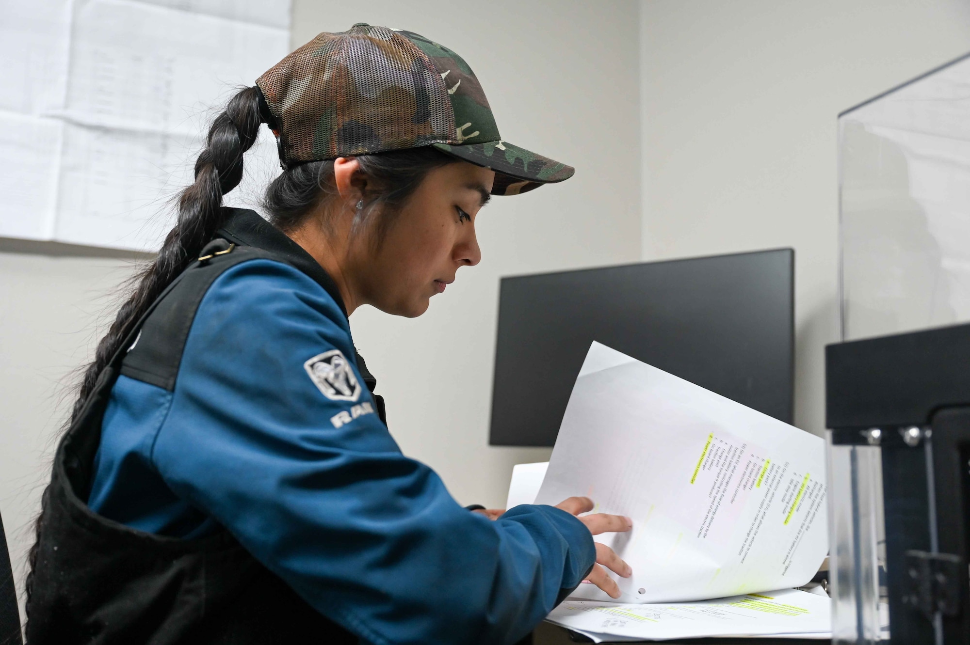 U.S. Air Force Senior Airman Heidi Delgado, 507th Logistics Readiness Squadron vehicle maintenance mechanic, reviews her study guide at Altus Air Force Base, Oklahoma, February
29, 2024. Delgado credits the new training curriculum with her success in Vehicle Maintenance upgrade training. (U.S. Air Force photo by Airman 1st Class Kari Degraffenreed)