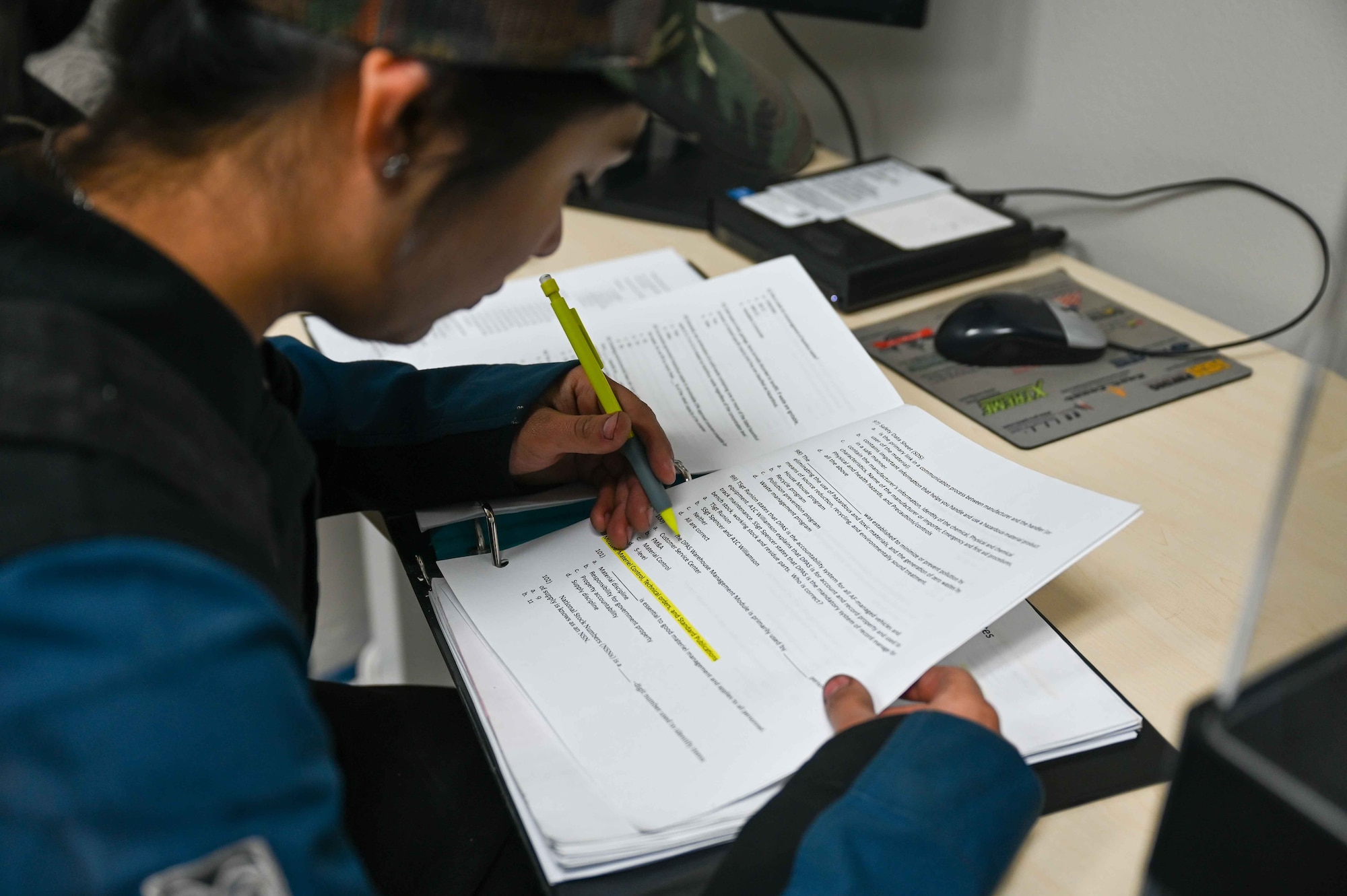U.S. Air Force Senior Airman Heidi Delgado, 507th Logistics Readiness Squadron mechanic, reviews her study guide at Altus Air Force Base, Oklahoma, February 29, 2024. This new model has brought the timeline of upgrade training from more than a year down to 90 days. (U.S. Air Force photo by Airman 1st Class Kari Degraffenreed)