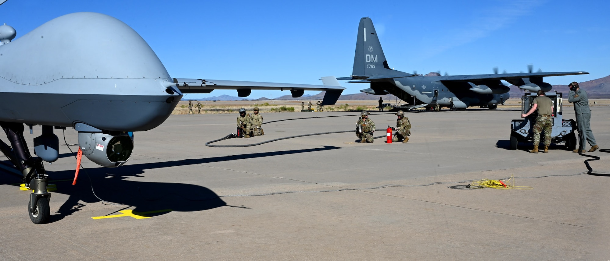 U.S. Airmen assigned to the 355th Logistics Readiness Squadron prepare for a forward area refueling point during Exercise Agile Angel at Fort Huachuca, Ariz., Feb. 20, 2024. The purpose of FARP operators was to expeditiously transfer fuel from a tanker aircraft into a receiver aircraft, while aircraft engines remain on. (U.S. Air Force photo by Staff Sgt. Abbey Rieves)