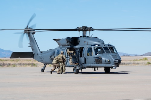 U.S. Airmen assigned to the 48th Rescue Squadron re-task to a combat search and rescue mission during Exercise Agile Angel at Fort Huachuca, Ariz., Feb. 20, 2024. The main objectives of Exercise Agile Angel were to execute at speed with a small number of personnel and with minimal active communications, which are all critical requirements to successfully execute ACE operations in a contested environment. (U.S. Air Force photo by Airman 1st Class Jasmyne Bridgers-Matos)