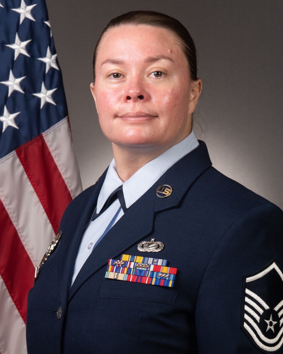 Official portrait of Master Sgt. Sheena M. Kuahine