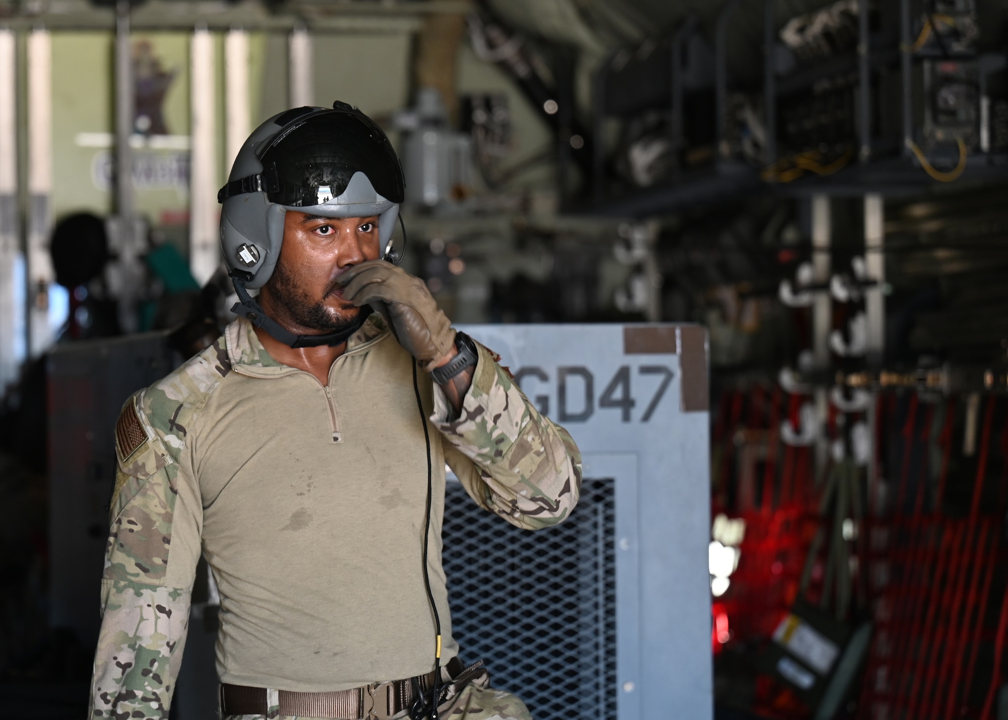 U.S. Air Force Master Sgt. Byron Simon, 79th Rescue Squadron loadmaster, evaluates cargo logistics during Exercise Agile Angel at Fort Huachuca, Ariz., Feb. 20, 2024. Simon’s goal was to continue military readiness in the simulated adverse conditions. (U.S. Air Force photo by Staff Sgt. Abbey Rieves)