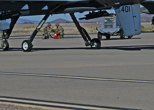 U.S. Airmen assigned to the 355th Logistics Readiness Squadron prepare for a forward area refueling point during Exercise Agile Angel at Fort Huachuca, Ariz., Feb. 20, 2024. The purpose of FARP operators was to expeditiously transfer fuel from a tanker aircraft into a receiver aircraft, while aircraft engines remain on. (U.S. Air Force photo by Staff Sgt. Abbey Rieves)