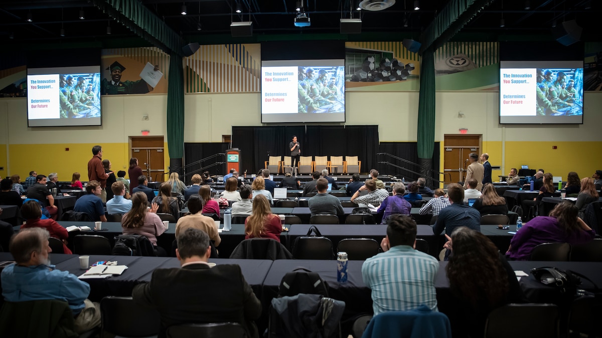 Scientists and engineers from the Air Force Research Laboratory, or AFRL, Department of Defense, other U.S. government agencies, academia, industry and state organizations listen to a presentation during the AFRL Biotech Days Summit Feb. 28, 2024, at Wright-State University in Dayton, Ohio. The two-day event included presentations highlighting the lab's early to mid-stage technologies and featured various speakers. (U.S. Air Force photo / Richard Eldridge).