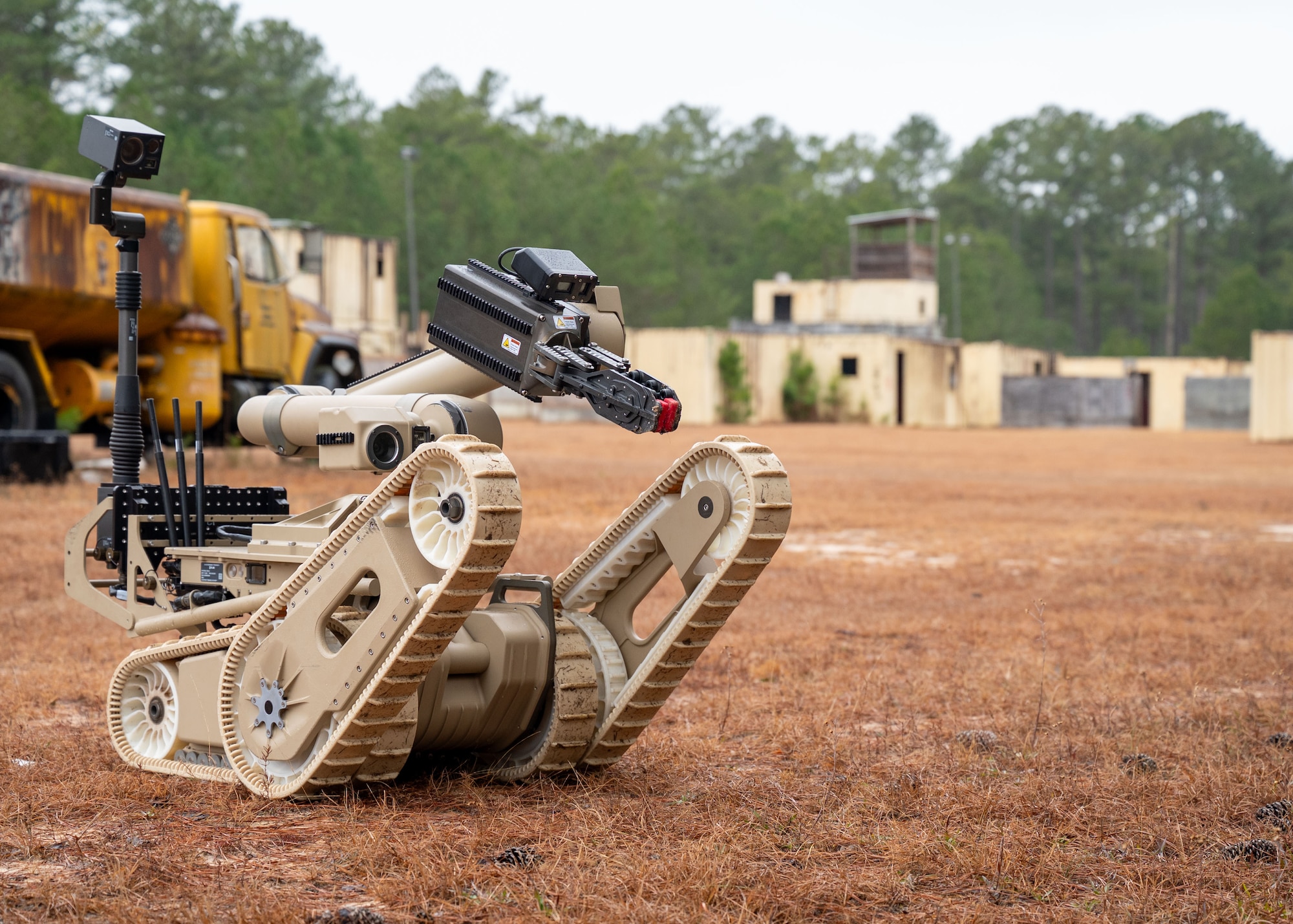 an EOD robot sits on the ground.