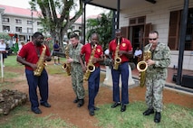 VICTORIA, Seychelles (Feb. 27, 2024) Members from the U.S. Naval Forces Europe and Africa Band and the Seychelles Defence Forces (SDF) Band perform for an audience at the Seychelles National Museum of History as part of exercise Cutlass Express 2024 (CE 24). Cutlass Express 2024, conducted by U.S. Naval Forces Africa and sponsored by U.S. Africa Command, increases the readiness of U.S. forces; enhances maritime domain awareness and collaboration among participating nations; and strengthens the capability of partner nations to combat piracy and counter illicit trafficking and illegal, unreported, and unregulated fishing.