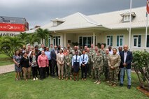VICTORIA, Seychelles (Feb. 29, 2024) Members from countries participating in exercise Cutlass Express 2024 (CE 24) pose for a photo at the Seychelles Regional Coordination Operations Center. Cutlass Express 2024, conducted by U.S. Naval Forces Africa and sponsored by U.S. Africa Command, increases the readiness of U.S. forces; enhances maritime domain awareness and collaboration among participating nations; and strengthens the capability of partner nations to combat piracy and counter illicit trafficking and illegal, unreported, and unregulated fishing. (U.S. Navy Photo by Chief Mass Communications Specialist Arif Patani)
