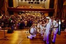 MAKO, Mauritius (March 2, 2024) The U.S. Naval Forces Europe-Africa Band performs at the Mahatma Gandhi Institute in Mauritius during exercise Cutlass Express 2024 (CE 24). Cutlass Express 2024, conducted by U.S. Naval Forces Africa and sponsored by U.S. Africa Command, increases the readiness of U.S. forces; enhances maritime domain awareness and collaboration among participating nations; and strengthens the capability of partner nations to combat piracy and counter illicit trafficking and illegal, unreported, and unregulated fishing. (U.S. State Department photo by Neddy Chanpin)