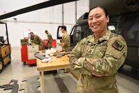 U.S. Army 1st Sgt. Angeli Viyar, Company First Sergeant standardizations instructor/senior flight medic, Delta Company 1-224th Aviation Regiment stands for a photograph at Davison Army Airfield, Feb. 3, 2024.  DCARNG Aviation is comprised of four different units with women visibly represented in all sections to include pilots, maintainers, supply, operations, administration, and flight paramedics.