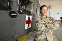 CW2 Jennifer A. Smith, UH-72 pilot, Alpha Company 1-224th Aviation Regiment, District of Columbia Army National Guard Aviation, stands for a photograph at Davison Army Airfield, Feb. 3, 2024.  DCARNG Aviation is comprised of four different units with women visibly represented in all sections to include pilots, maintainers, supply, operations, administration, and flight paramedics.