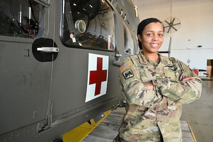 CW2 Jennifer A. Smith, UH-72 pilot, Alpha Company 1-224th Aviation Regiment, District of Columbia Army National Guard Aviation, stands for a photograph at Davison Army Airfield, Feb. 3, 2024.  DCARNG Aviation is comprised of four different units with women visibly represented in all sections to include pilots, maintainers, supply, operations, administration, and flight paramedics.