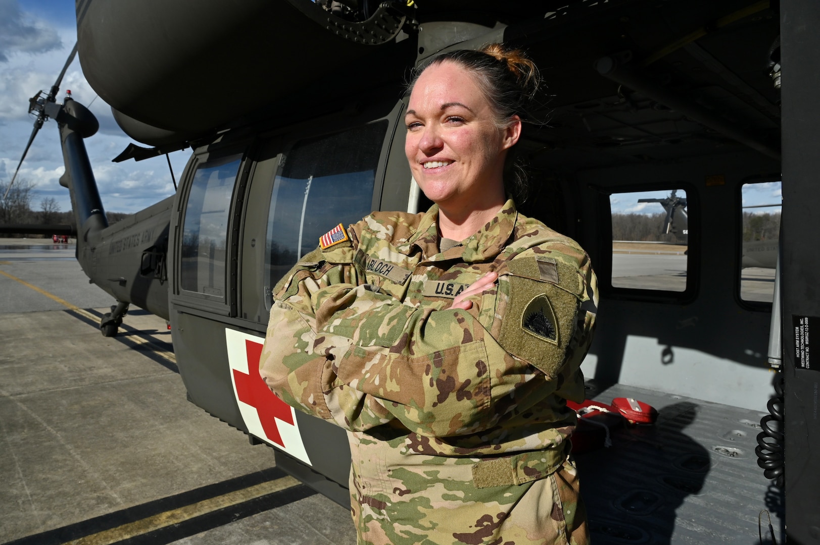 CW2 Lauren A. Bloch, UH-60 medevac instructor pilot, Detachment 2 Company G 2-104th GSAB, District of Columbia National Guard, stands for a photograph at Davison Army Airfield, Feb. 3, 2024.  DCARNG Aviation is comprised of four different units with women visibly represented in all sections to include pilots, maintainers, supply, operations, administration, and flight paramedics.