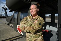 CW2 Lauren A. Bloch, UH-60 medevac instructor pilot, Detachment 2 Company G 2-104th GSAB, District of Columbia National Guard, stands for a photograph at Davison Army Airfield, Feb. 3, 2024.  DCARNG Aviation is comprised of four different units with women visibly represented in all sections to include pilots, maintainers, supply, operations, administration, and flight paramedics.