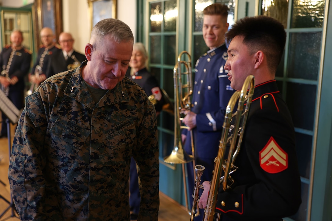 U.S. Marine Corps Maj. Gen. Robert B. Sofge Jr., left, commander of U.S. Marine Corps Forces Europe and Africa, attends a band practice of members of the Nordic band element during the preparation phase of Exercise Nordic Response 24 in Oslo, Norway, Mar. 6, 2024. Military band members from Norway, Sweden, Finland, and the U.S. have gathered amidst Nordic Response 24 to symbolize the growth and camaraderie of the nations. This ensemble will play in various locations around Europe during the military exercise. (U.S. Marine Corps photo by Lance Cpl. Garrett Gillespie)