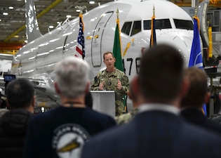 Vice Adm. John B. Mustin takes delivery of the first new P-8A Poseidon for the Naval Air Force Reserve.