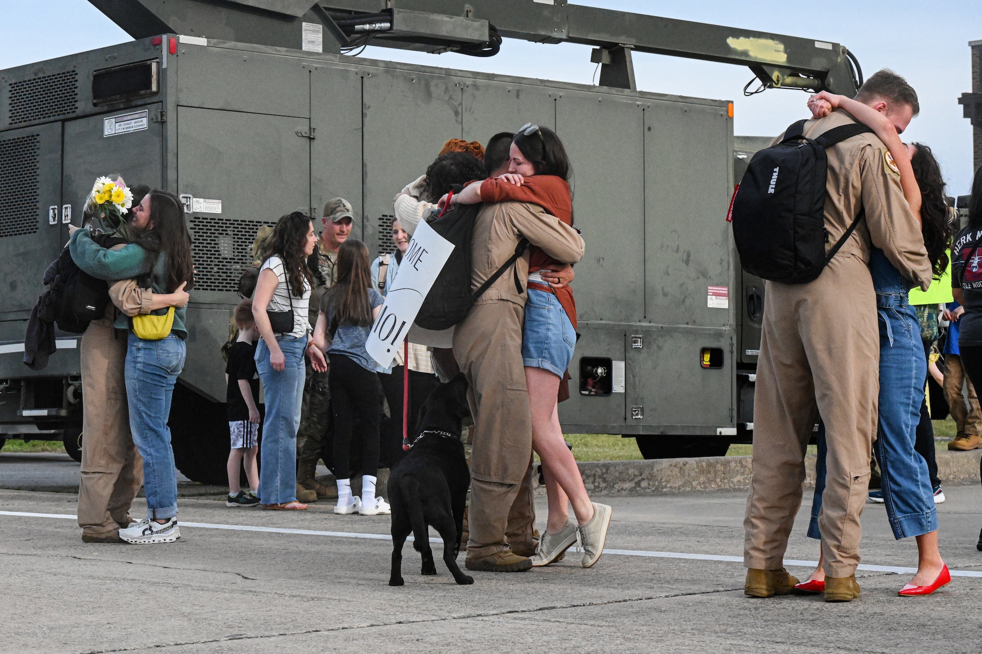 Airmen greet family members.