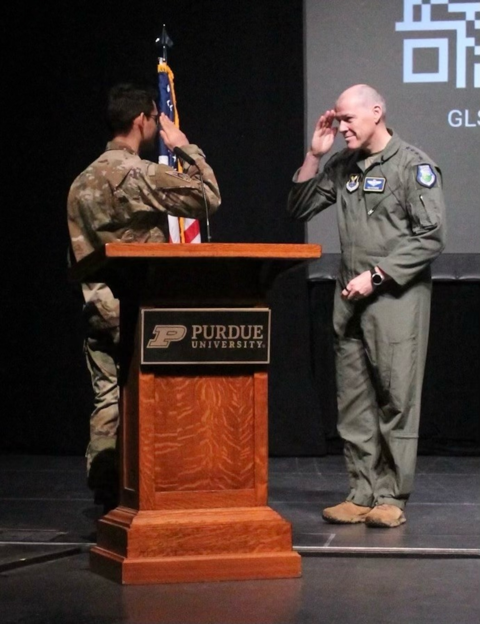 Cadet Lieutenant Colonel Alexander Weber, Detachment 220 Director of Space Operations salutes Gen. Thomas Bussiere, commander of Air Force Global Strike Command, at the Giant Leaps Summit at Purdue University, Feb. 24, 2024. The Air Force Reserve Officers’ Training Corps Detachment 220 Cadet Delta hosted the event, bringing together academia, industry and Department of Defense professionals to discuss the future of national defense. (U.S. Air Force photo by ROTC Detachment 220 Cadet Delta)
