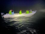A 33-foot Special Purpose Craft Law Enforcement boat crew from Coast Guard Station South Padre Island surveys a Mexican lancha off the southern Texas coast, March 5, 2024. Coast Guard Station South Padre Island interdicted a lancha and seized 220 pounds of red snapper. (U.S. Coast Guard photo, courtesy Station South Padre Island)