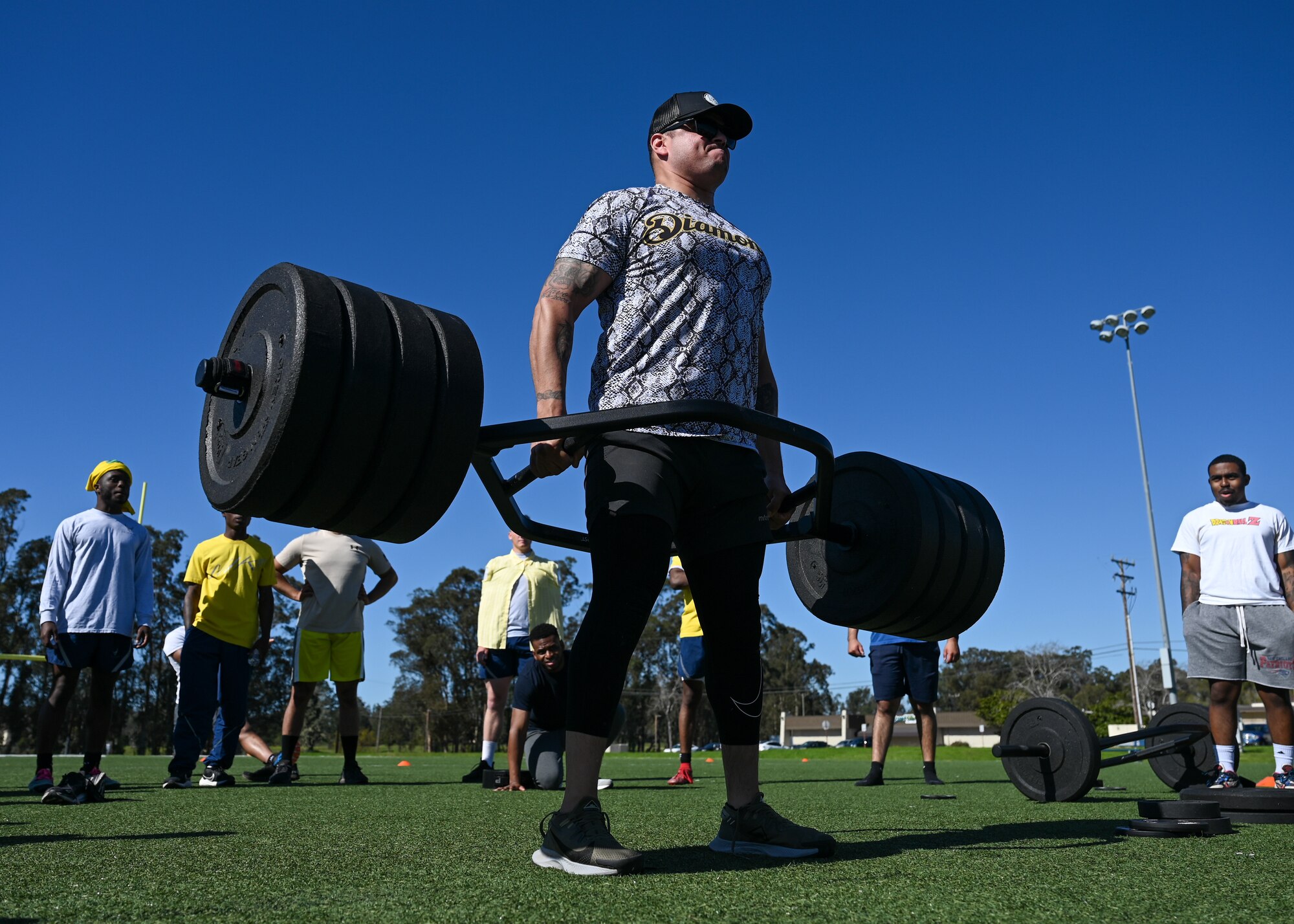 Master Sgt. Octavio Juarez lifts weights during the powerlifting competition.