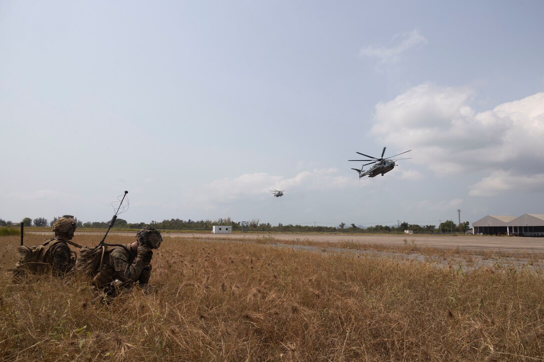 U.S. Marine Corps CH-53E Super Stallions assigned to Marine Medium Tiltrotor Squadron (VMM) 165 (Reinforced), 15th Marine Expeditionary Unit, extract Marines assigned to Charlie Company, Battalion Landing Team 1/5, 15th MEU from an airfield seizure at Exercise Cobra Gold at Utapao International Airport, Rayong province, Kingdom of Thailand, March 1, 2024. Participating nations conducted operations simultaneously across multiple locations to refine combined command and control processes. Cobra Gold, now in its 43rd year, is a Thai-U.S. co-sponsored training event that builds on the longstanding friendship between the two allied nations and brings together a robust multinational force to promote regional peace and security in support of a free and open Indo-Pacific. (U.S. Marine Corps video by Gunnery Sgt. Antonio Campbell)